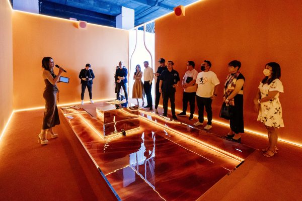 The host introduces guests to the timeless themes of cognac, couture, and craft.