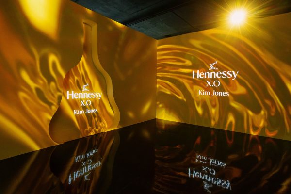 A Hennessy X.O x Kim Jones spatial projection takes over the space, and the exhibition begins.