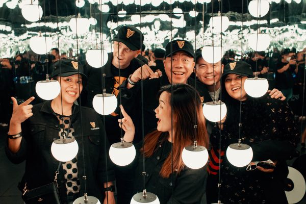 Guests get up close with the Guinness innovation called the Widget at the interactive light installation.